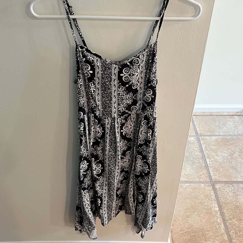 Black and white flowy dress. Worn multiple times but still looks brand new.